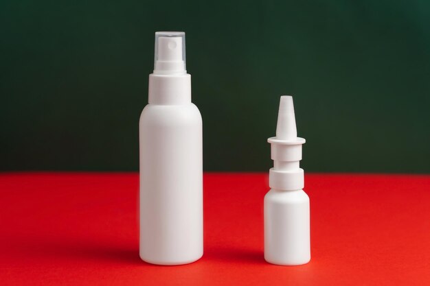 Medicines for treatment of nose and throat Nasal and throat spray isolated bottles Mockup