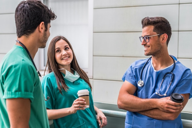 Medics drinking coffee during break time in hospital