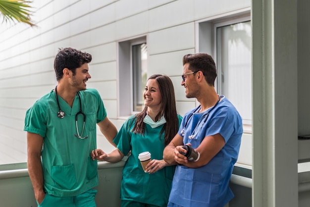 Medics drinking coffee during break time in hospital