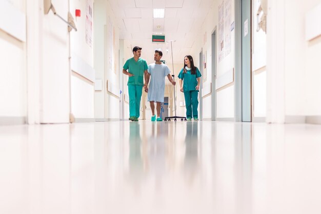 Medics and patient in hall