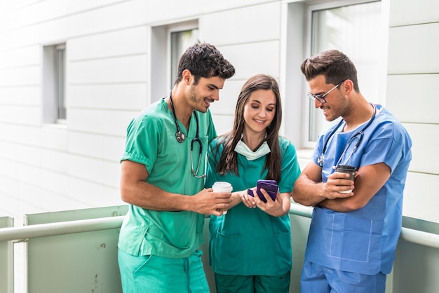 Medics watching smartphone