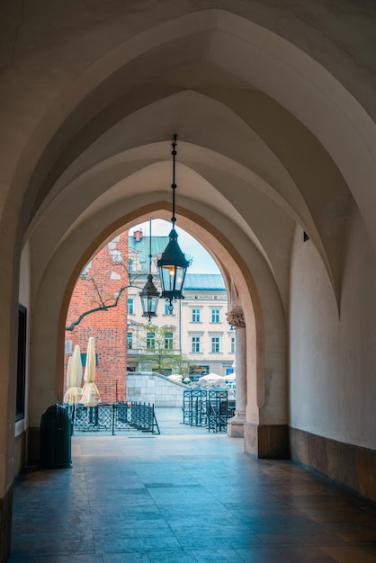 Medieval arched passage to the old trade square of Krakow.