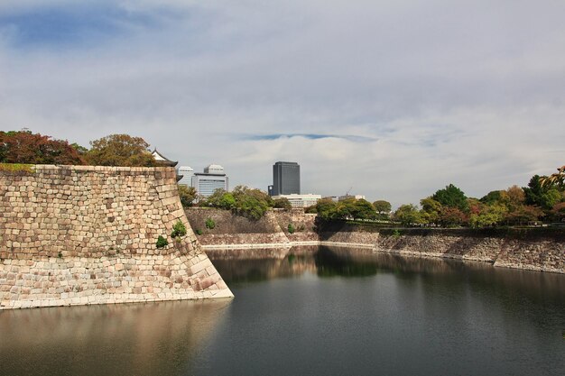 The medieval castle at autumn Osaka Japan