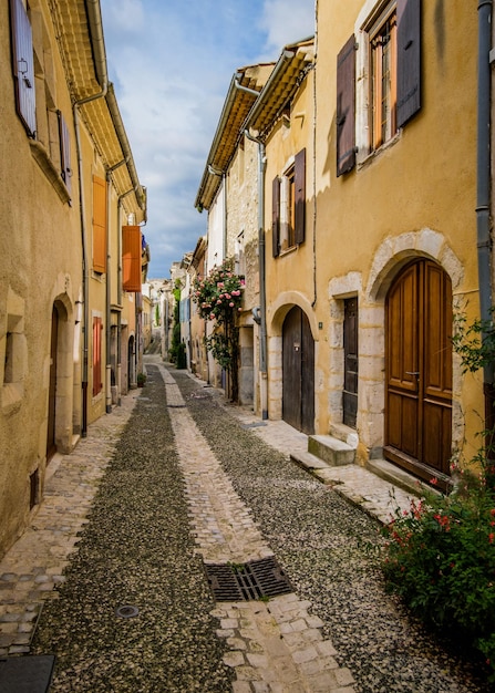 Medieval houses and cobblestone street in the village of Rochemaure, in the South of France, Ardeche