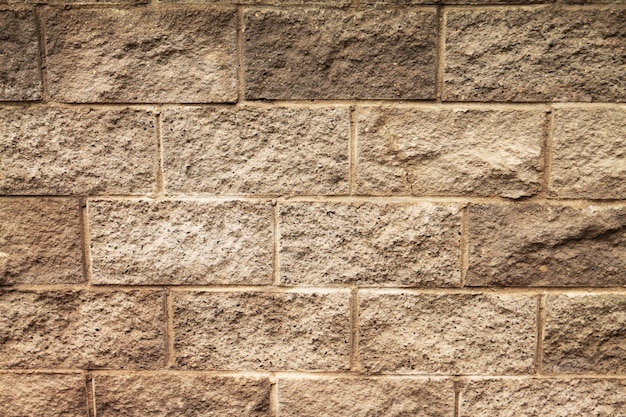 Medieval old house Texture of brick old masonry in brown color