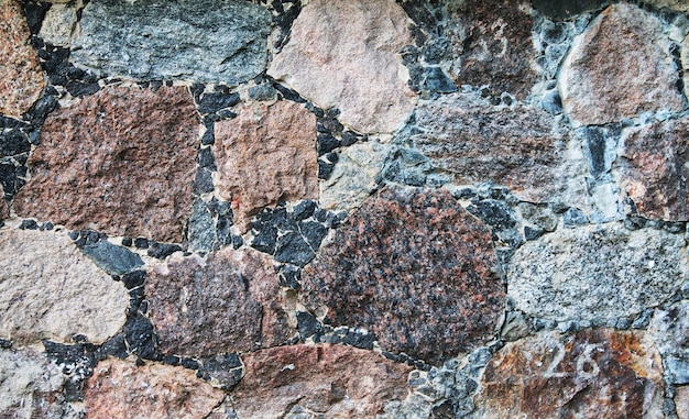 Medieval old house Texture of old stonework in different colors