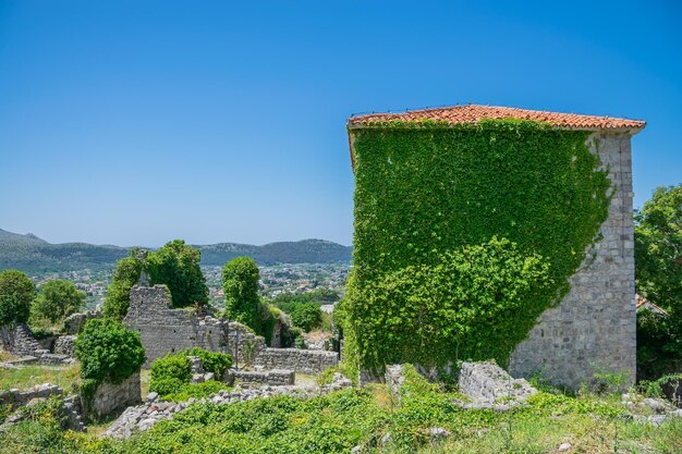 Medieval stone fortress is located high in the mountains