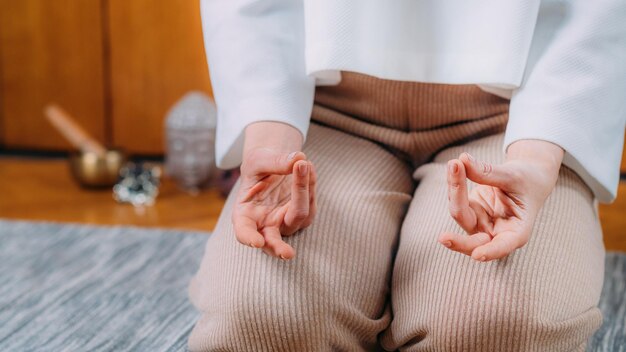 Meditating woman peaceful woman sitting and meditating