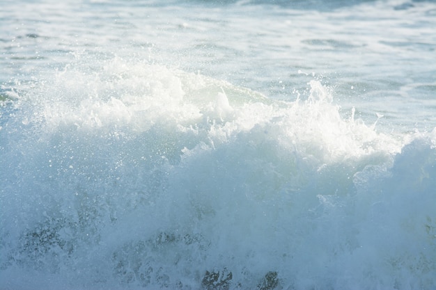 Photo mediterranean sea waves breaking background, green water