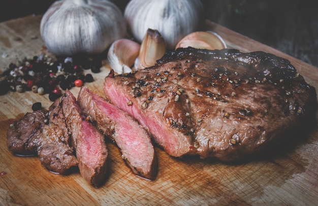 Medium rare beef steak cut slice.