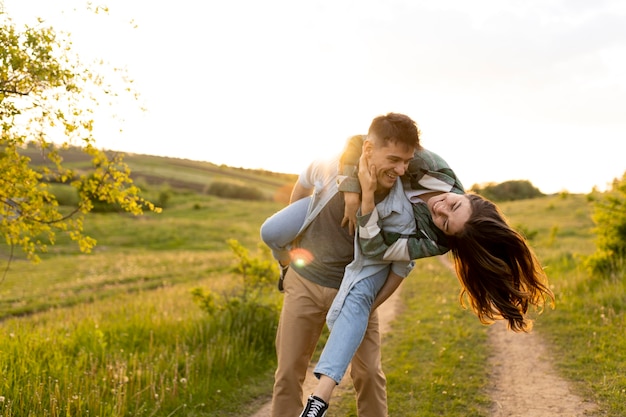 Medium shot couple having fun