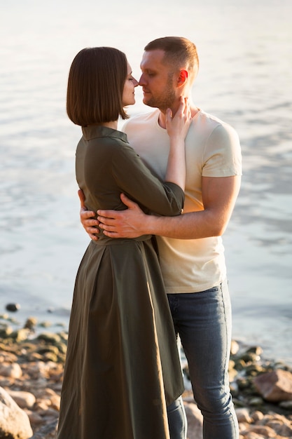 medium shot couple posing together