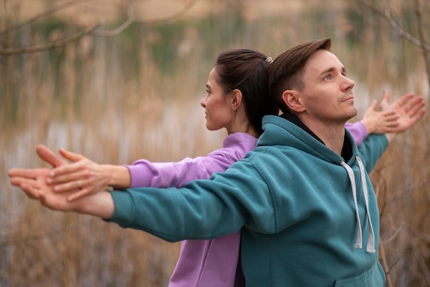 Medium shot couple training together