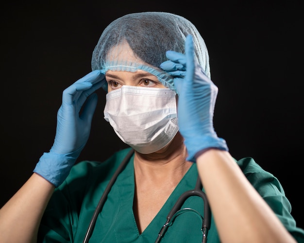 Medium shot doctor with hair net