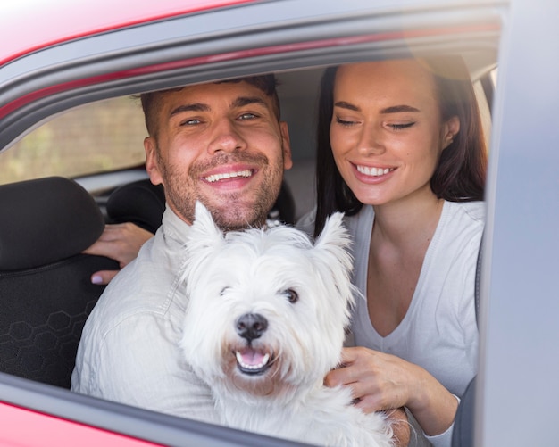 Photo medium shot happy couple and dog