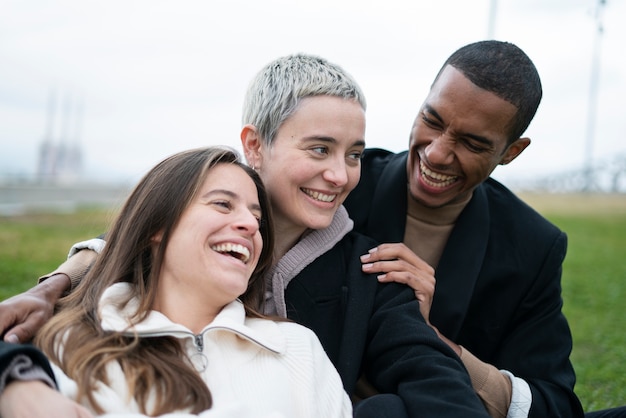 Medium shot happy polyamorous partners