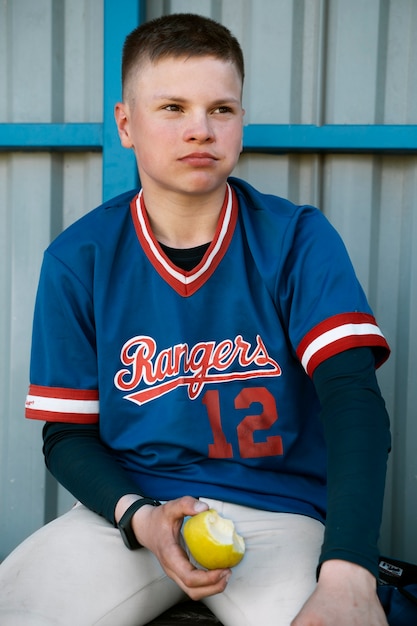 Medium shot kid eating apple