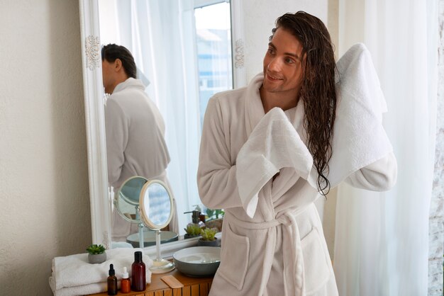 Medium shot man hair slugging night routine