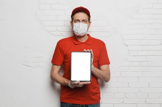 Medium shot man holding tablet