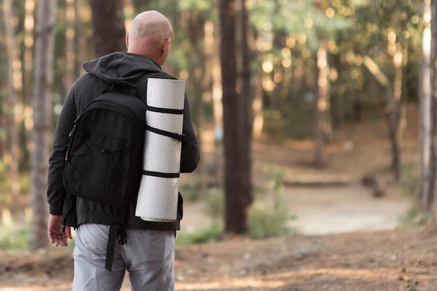 Medium shot man walking on road