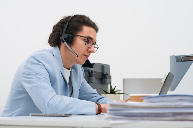 Medium shot man working in office