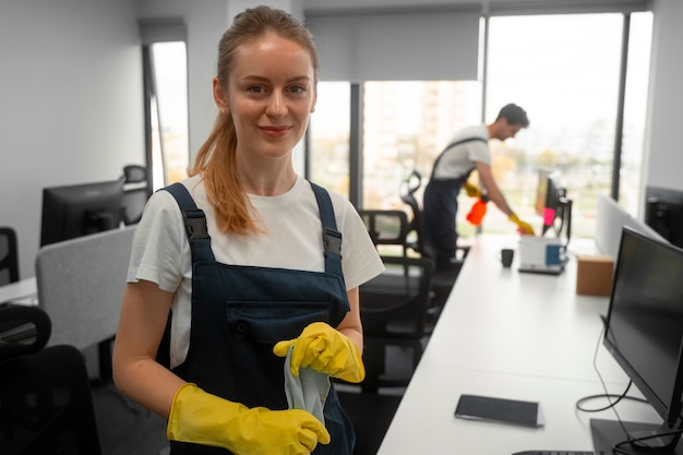 Medium shot people cleaning building