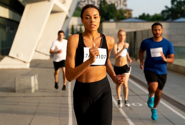 Medium shot people running