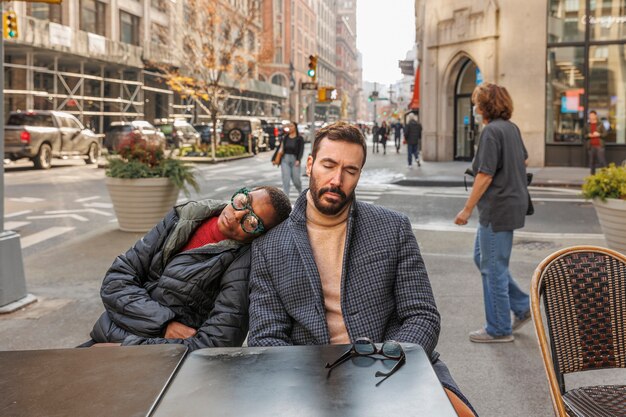 Medium shot people sleeping outdoors