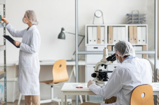 medium shot researchers working