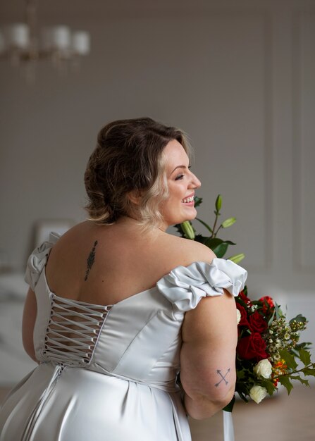 Medium shot smiley bride at wedding