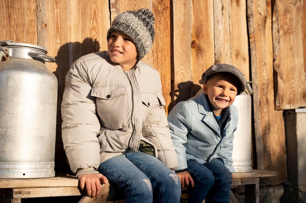 Photo medium shot smiley kids rural life