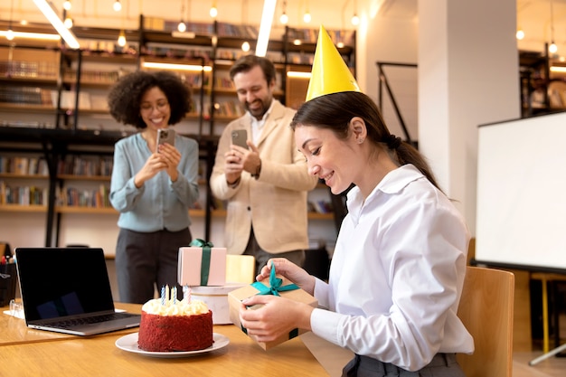 Medium shot woman celebrating birthday