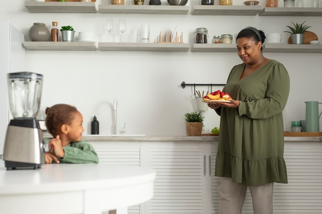 Medium shot woman holding food plate