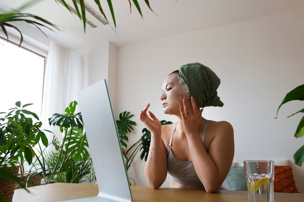 Photo medium shot woman practicing selfcare