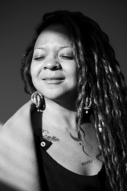 Medium shot woman in studio black and white