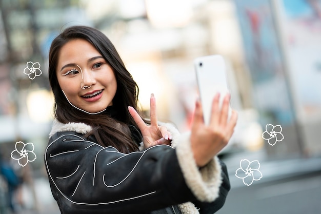 Medium shot woman taking selfie