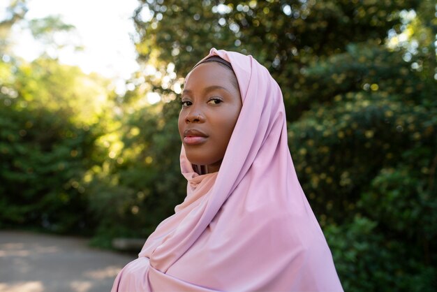 Photo medium shot woman wearing halal outdoors