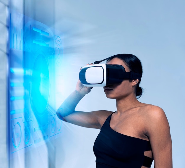 Medium shot woman wearing vr glasses