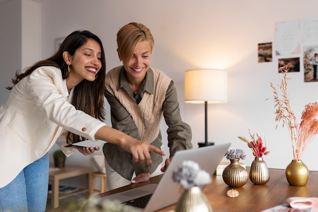 medium shot women working as wedding planners