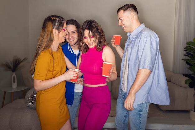 Photo medium shot young people dancing at party