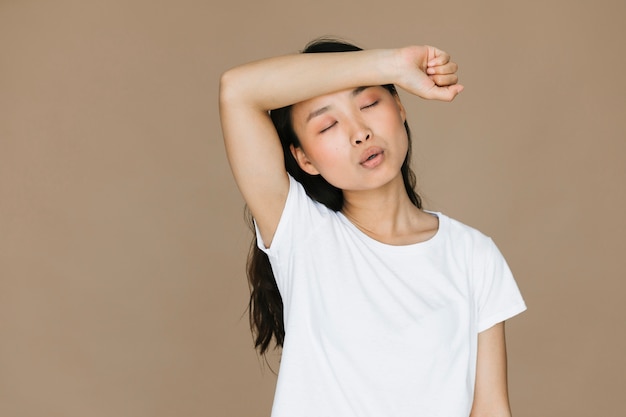 Medium shot young woman being tired