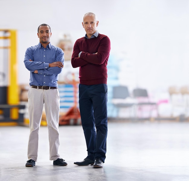 Meet the inspectors Portrait of two factory managers doing a warehouse inspection