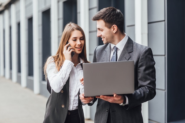 Meet of two success peoplewith laptop discusing