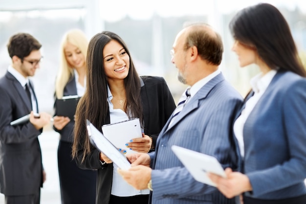 Meeting business partners before presentation in the lobby