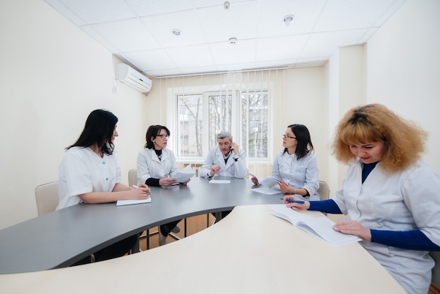 Meeting of doctors in the clinic about the virus epidemic. Virus, and epidemic, quarantine