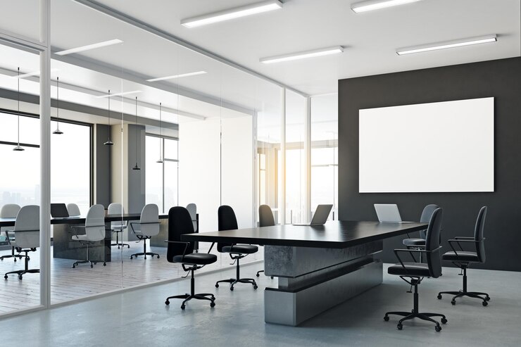 Meeting room with blank poster