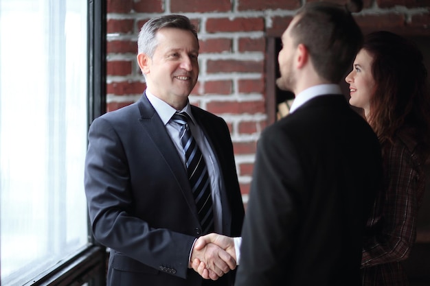 Meeting of two companions in the office