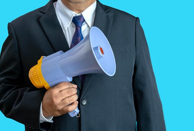 A megaphone in leader for public speech isolate on aqua blue background person