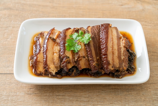 Photo mei cai kou rou  or steam belly pork with swatow mustard cubbage recipes - chinese food style