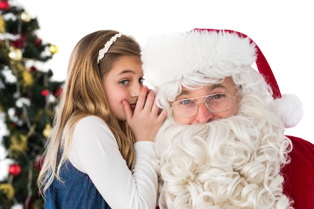 Meisje die de Kerstman een geheim vertellen